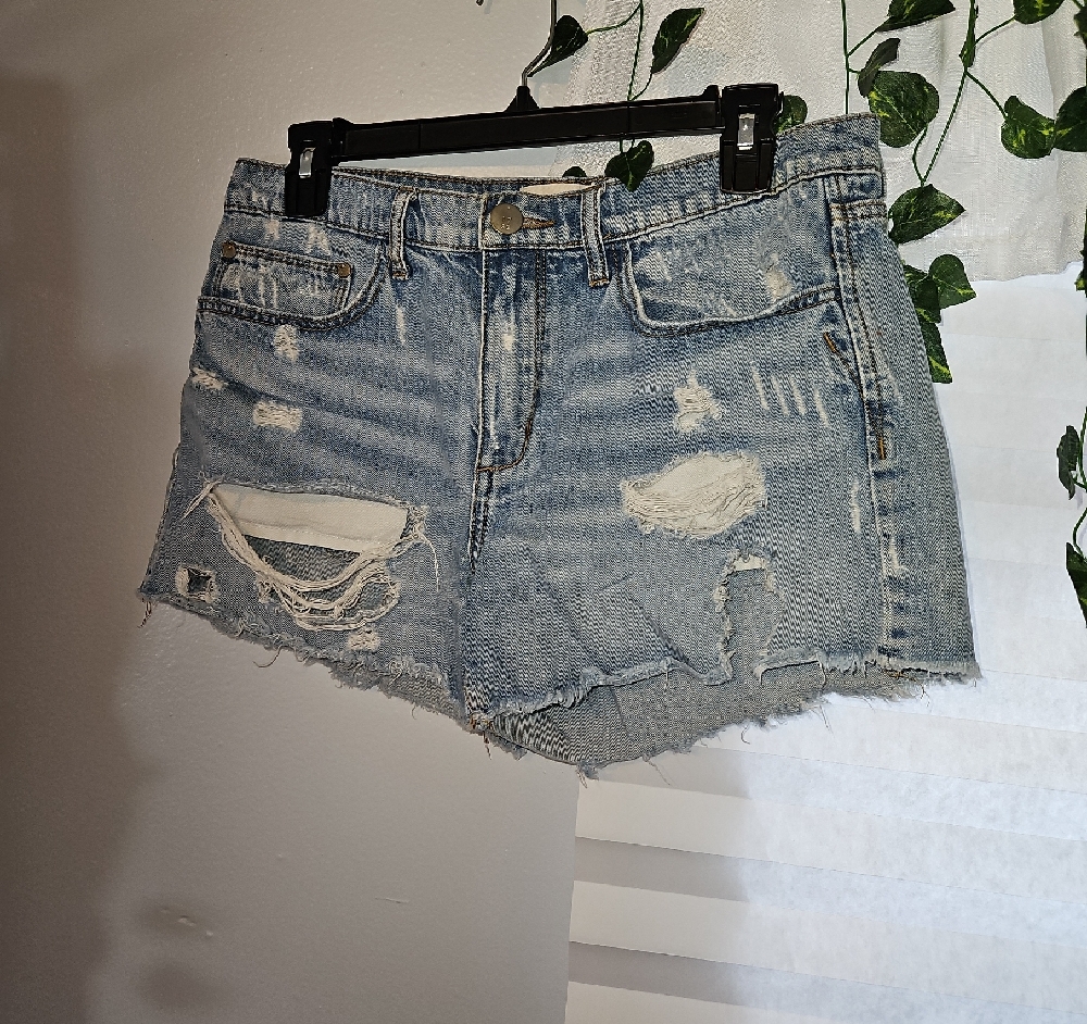 Gilded Intent Distressed Mid Rise Jean Shorts
